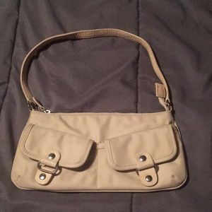 This is a Banana republic purse never worn brand new Sandy brown